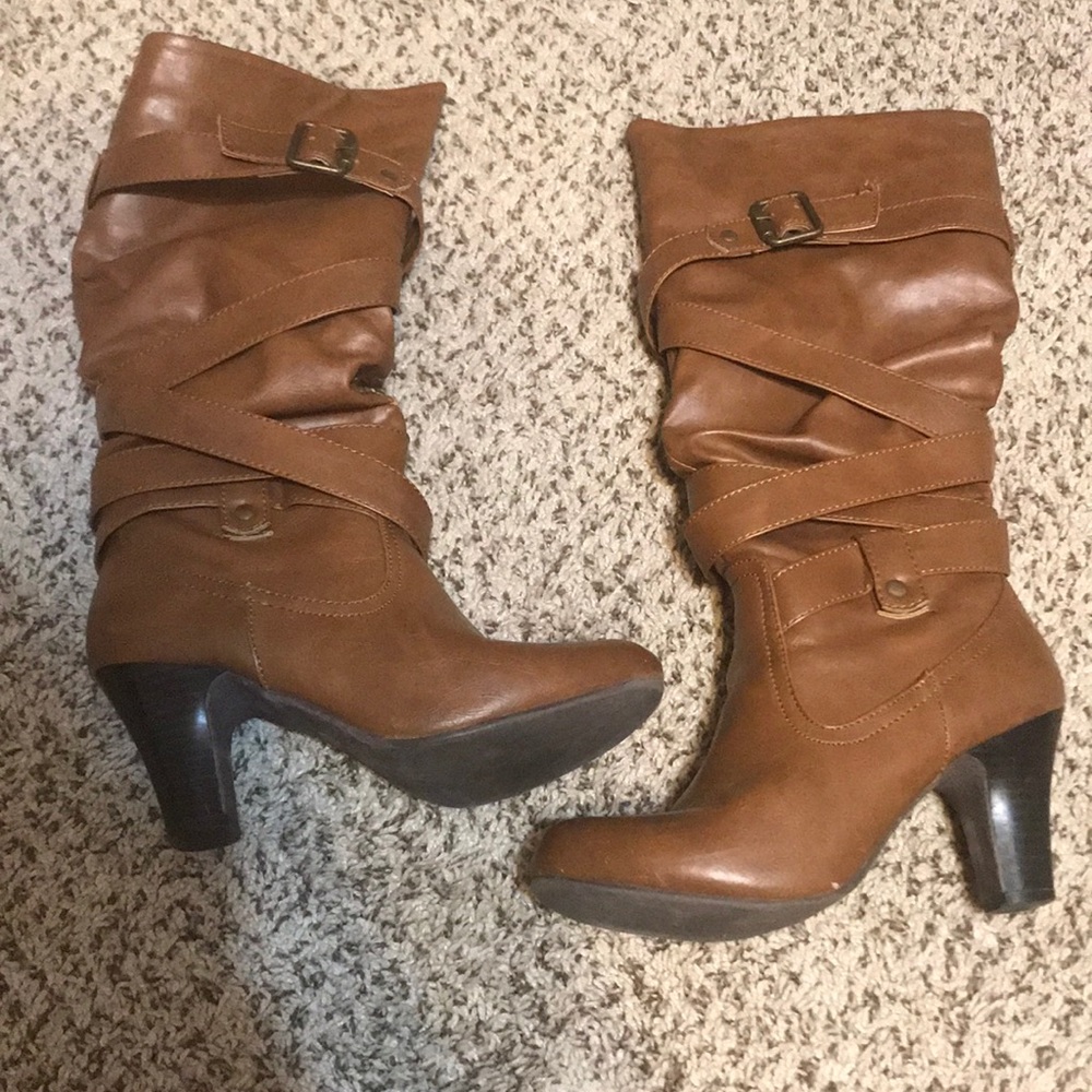 Calf height tan high heeled boots
